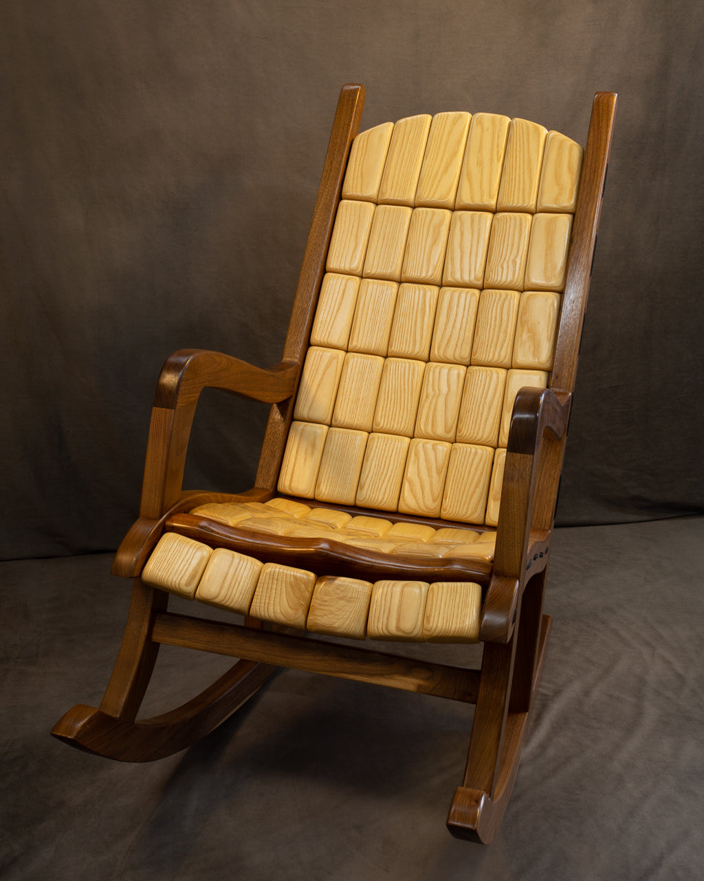 Walnut Rocking Chair. High back rope and block rocking chair with ash blocks.